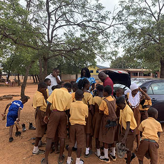 Growth Mindset Development Foundation donating some shoes to school children