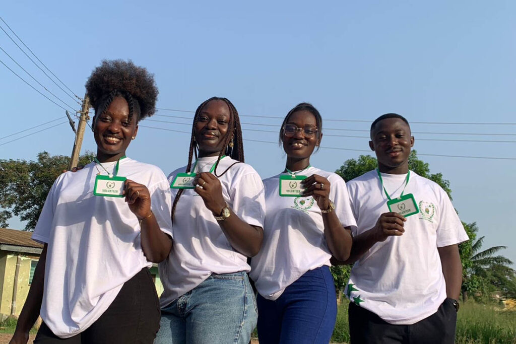 Some Growth Mindset Development Foundation volunteers posing with their card